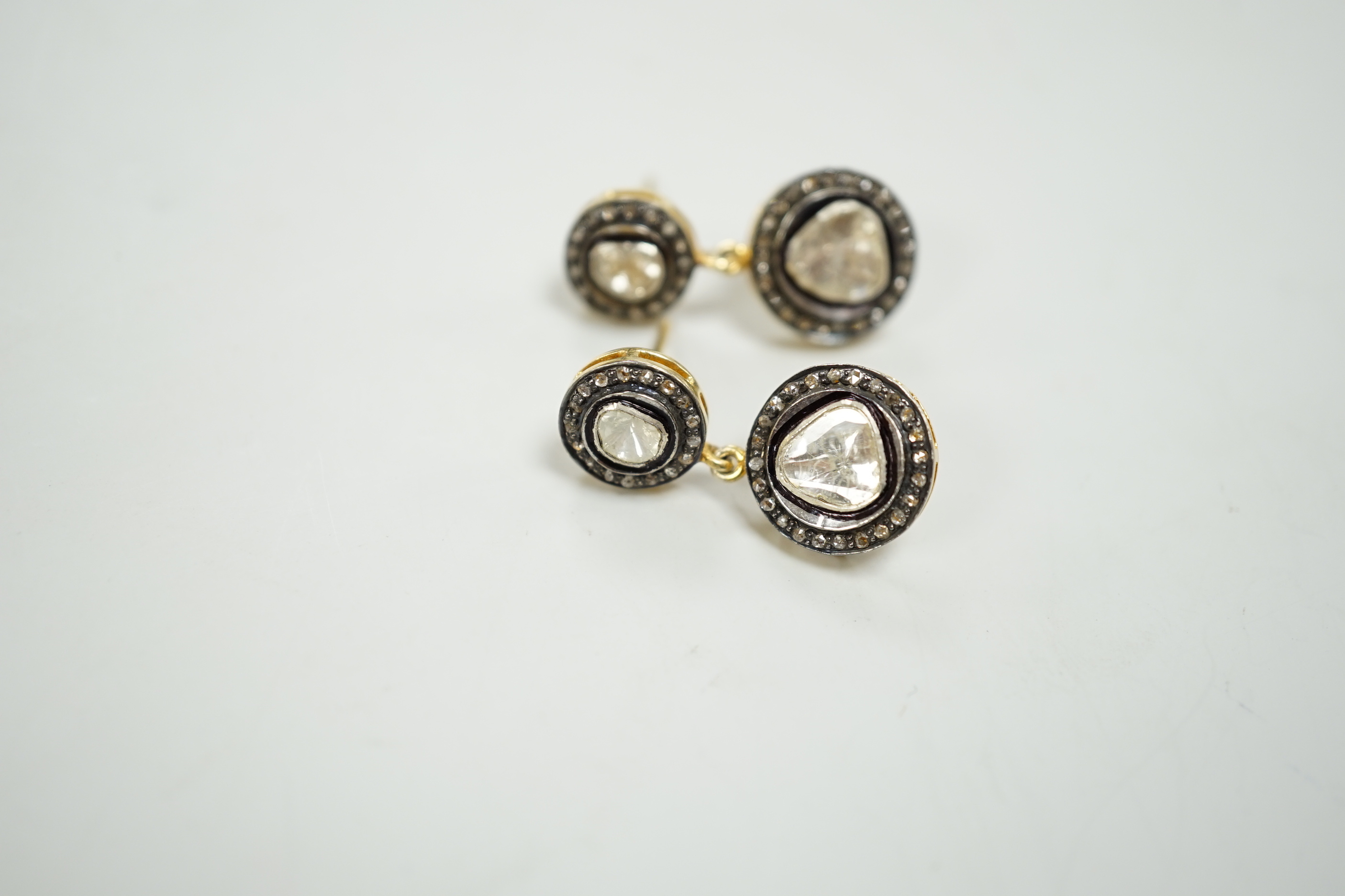 A pair of Indian? yellow metal, flat and rose cut diamond cluster set drop earrings, 27mm, gross weight 5.7 grams.